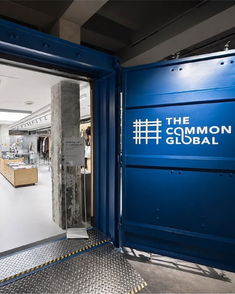 The Common Global: entrance through blue shipping-container doors